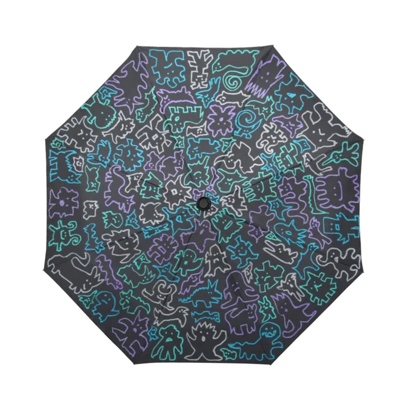 umbrella with hand-drawn design featuring cute monsters