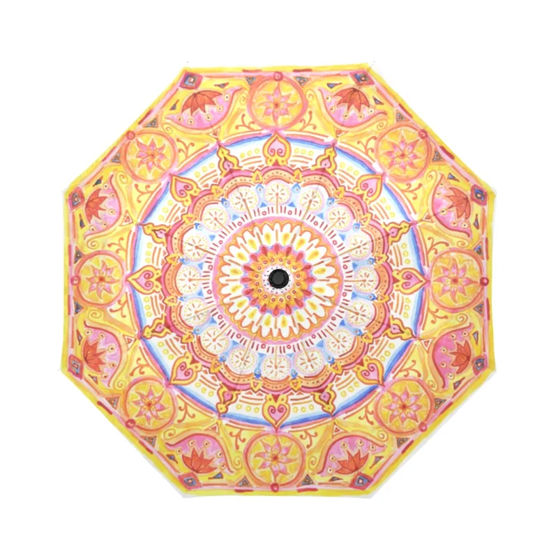 umbrella with hand-drawn pen and ink mandala design, with hearts, lotus flowers, pink and yellow
