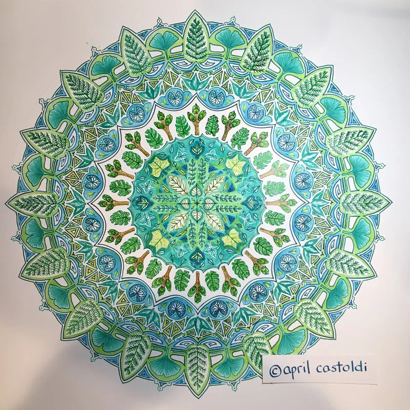 hand drawn pen and ink mandala with leaves